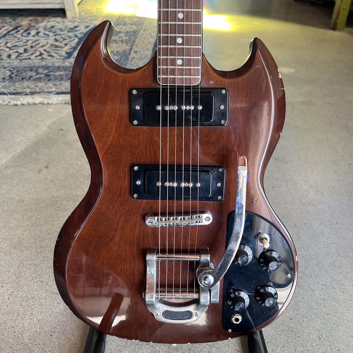 Full front body view of the Cherry Ibanez SG Special showcasing the batwing pickguard, dual P-90s, and tremolo system